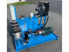 Power unit with cooler and electrical control box.